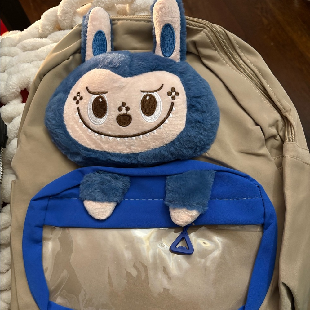 Cute Beige and Blue Backpack with Monster Design - Picture 1 of 1